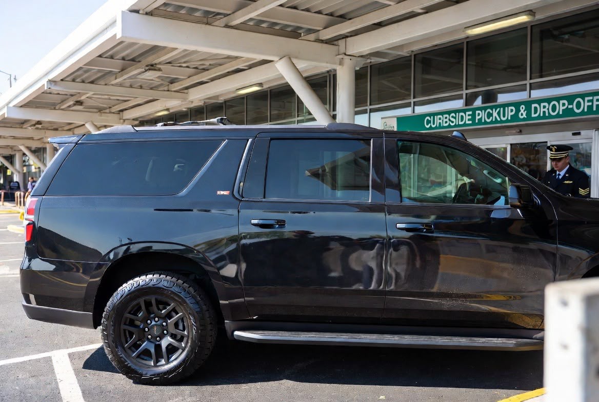 Airport curbside luxury SUV JFK car service New Jersey